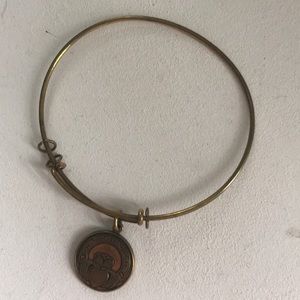 Alex and Ani bracelet worn with love tarnished loo